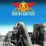 NEW STRINGS ATTACHED: Aerosmith's 19XX album "Rock in a Hard Place" featured guitarists Jimmy Crespo and Rick Dufay replacing original guitarists Joe Perry and Brad Whitford. Despite an admitted lack of focus due to copious amounts of drugs, many fans give the album a thumbs-up.