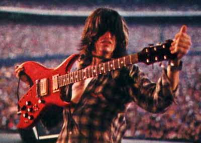 LIFE'S A BICH: Perry and his BC Rich Bich guitar in front of another stadium crowd during the late 1970s. It's safe to wager Perry is as amped as his guitar.