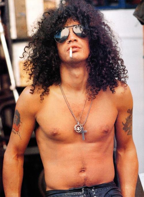 SMOKE MY CIGARETTE WITH STYLE: After decades of huffing cigarettes, Slash finally gave up the filthy habit of wearing shirts.