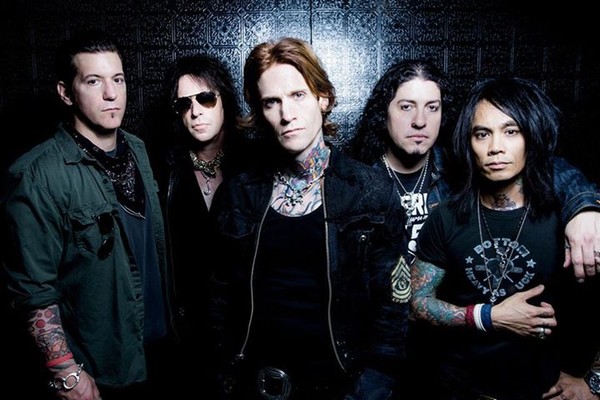 Odd Man Out: Jimmy wearing shades with his former Buckcherry mates.